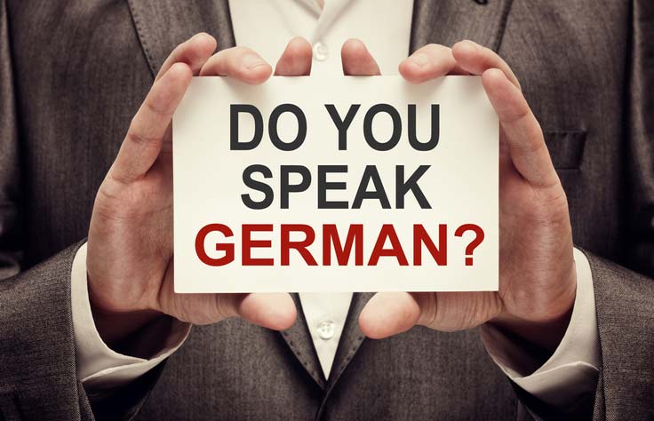 Einstufungstest Deutsch. Auf einer Tafel steht geschrieben: Sprechen Sie Deutsch?